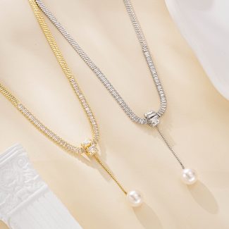 Gold and silver pearl drop snake chain necklace options shown together