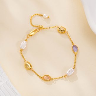 Bracelet with pearl accents, pastel oval stones and gold-tone beads