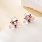 Pair of floral pearl stud earrings with black spinel accents