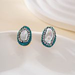 Silver-plated copper pearl studs with a two-tone sparkling border