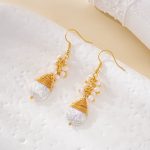 Freshwater pearl clusters and gold-tone wire on drop earrings