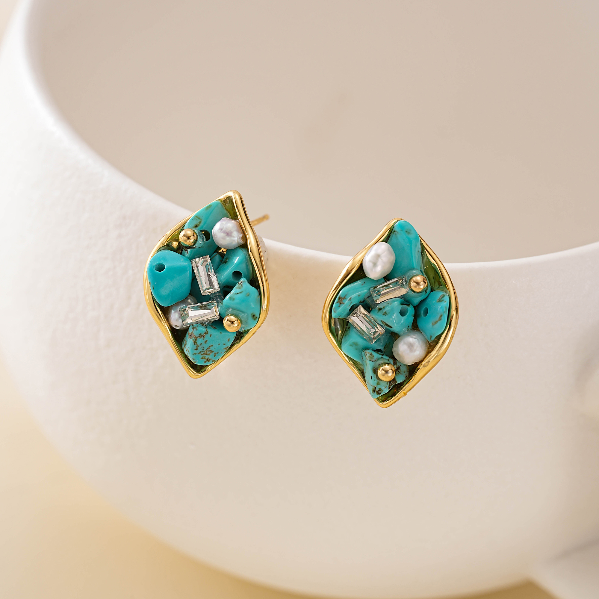 Gold-plated copper leaf studs with turquoise and clear accents