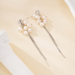 Silver-tone pearl drop earrings with three slender tassels