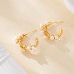 Front view of gold-tone hoops with clustered pearls