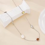 Long mixed-station necklace with silver-tone chain