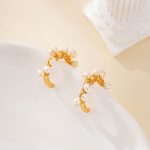 Side view of wire-wrapped pearl hoop earrings