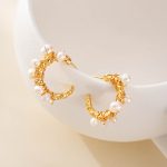 Wire-wrapped gold-tone hoop earrings with freshwater pearls